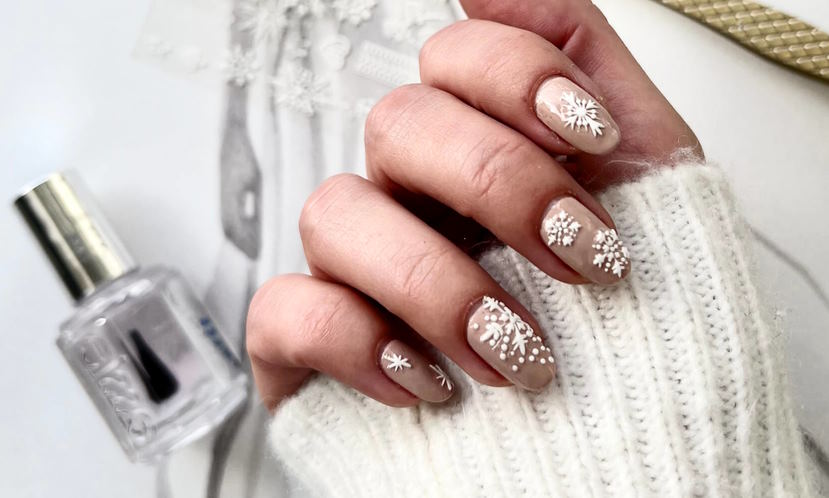 creating a snowflake design on nails